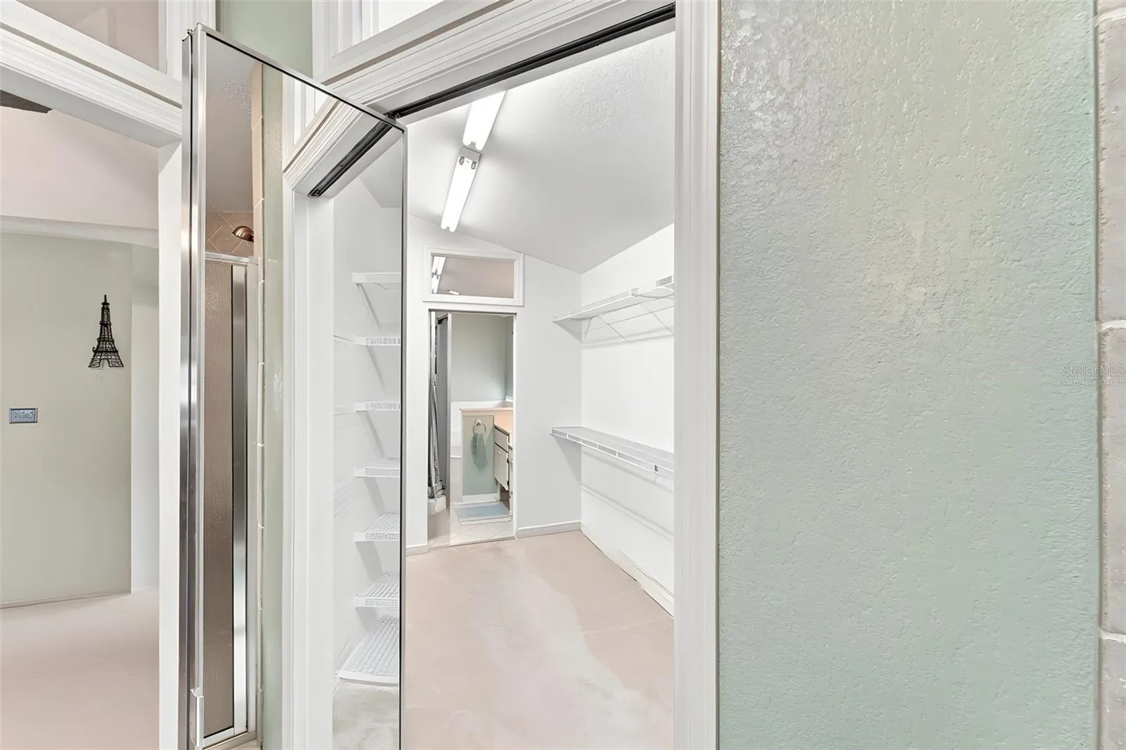 Virtually staged, look at this huge walk in closet that is adjoining the ensuite bathroom