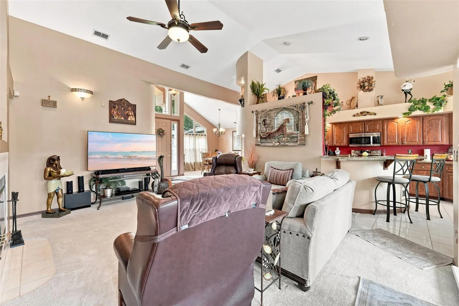 This angle shows the main living area and kitchen, look at how much natural lighting flows throughout!