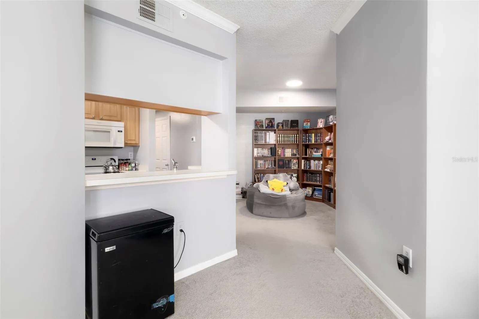 Living Area to Kitchen.