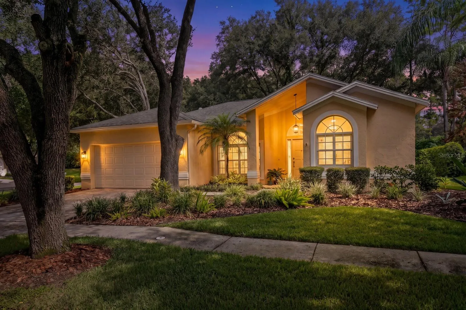 Twilight Front exterior 9302 Knightsbridge Court