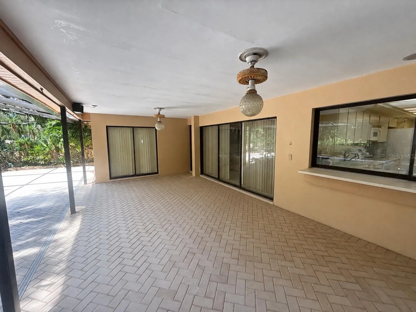 Large covered outdoor entertaining area. Digitally enhanced