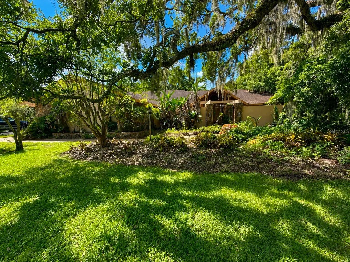 Beautiful tropical greenery throughout the property creates a peaceful, estate-like setting