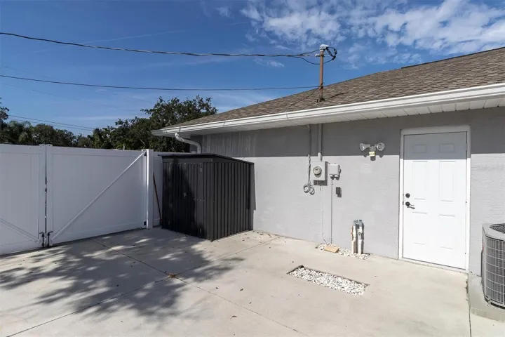 In back of the driveway gate and off the side of the garage you will find another large area to park your boat, rv, work van, or any other toys you have!