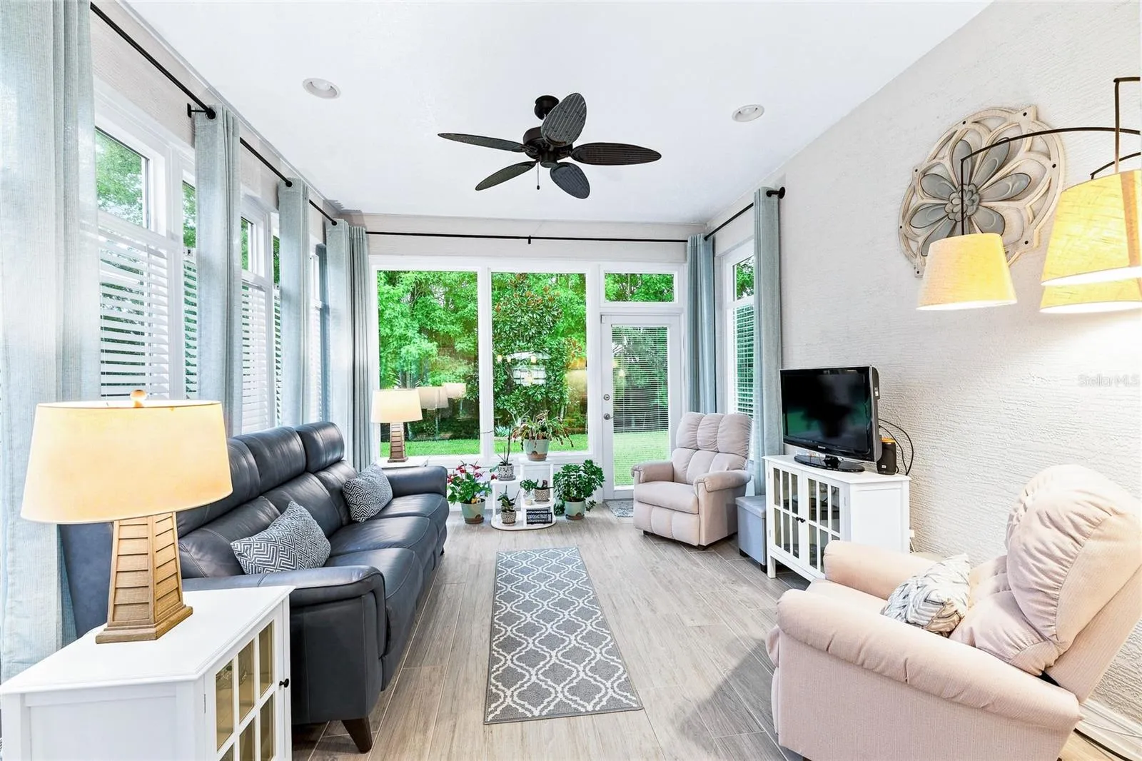 Your new favorite room! This heated and air-conditioned Florida room offers comfortable, year-round living space for relaxing, entertaining or enjoying the sunshine—without the heat