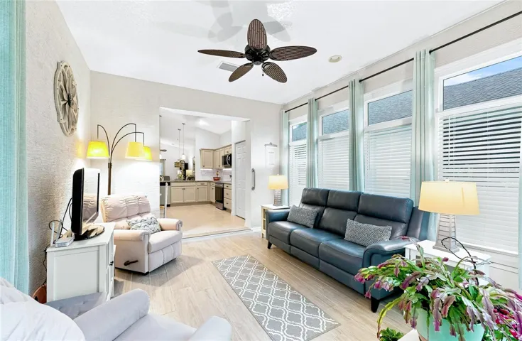 Your new favorite room! This heated and air-conditioned Florida room offers comfortable, year-round living space for relaxing, entertaining or enjoying the sunshine—without the heat