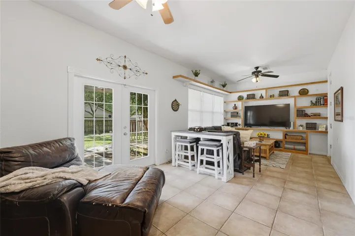 Family Room w/tiles floors and built ins