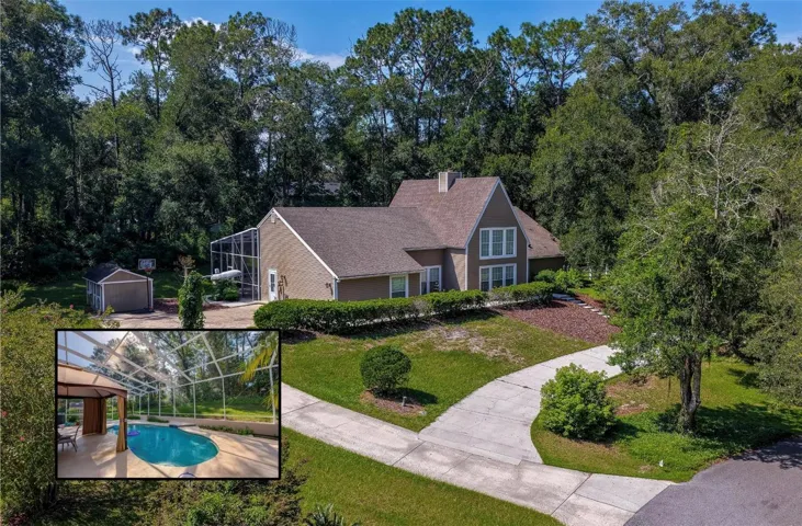 Impressive aerial view showcasing the home’s spacious setting surrounded by mature trees, circular driveway, and screened-in pool. Inset highlights the inviting pool and expansive screened enclosure