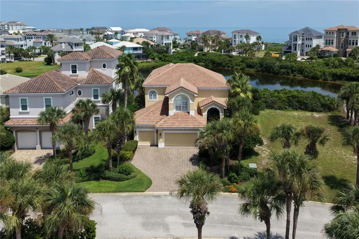 It starts with the setting. 27 Sandpiper Lane rests along the lake in Ocean Hammock