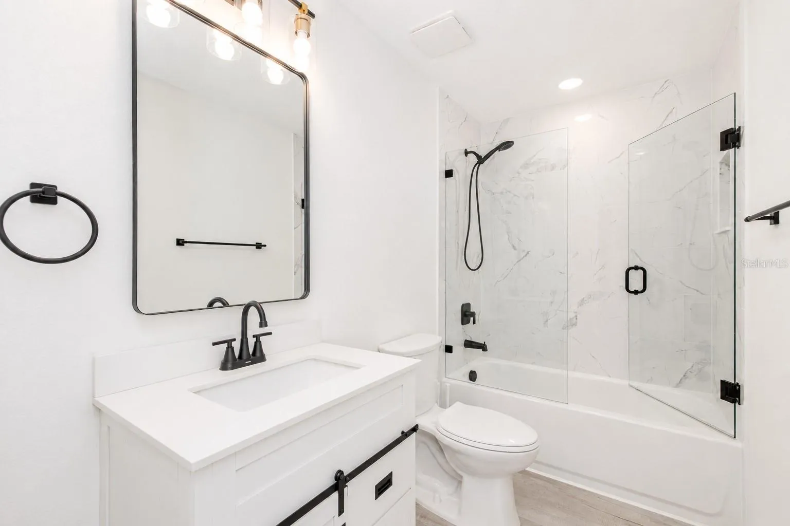 Guest bathroom with shower and tub.