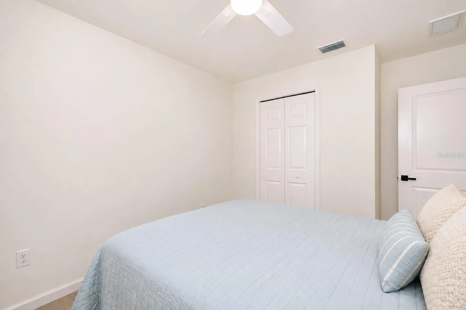 Bedroom two with closet.