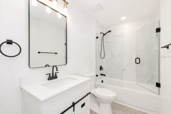 Guest bathroom with shower and tub.