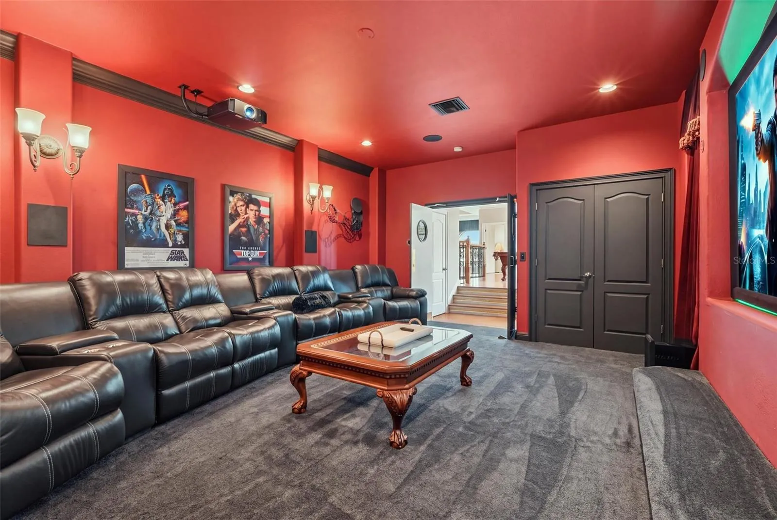 Everything in the theatre room conveys.