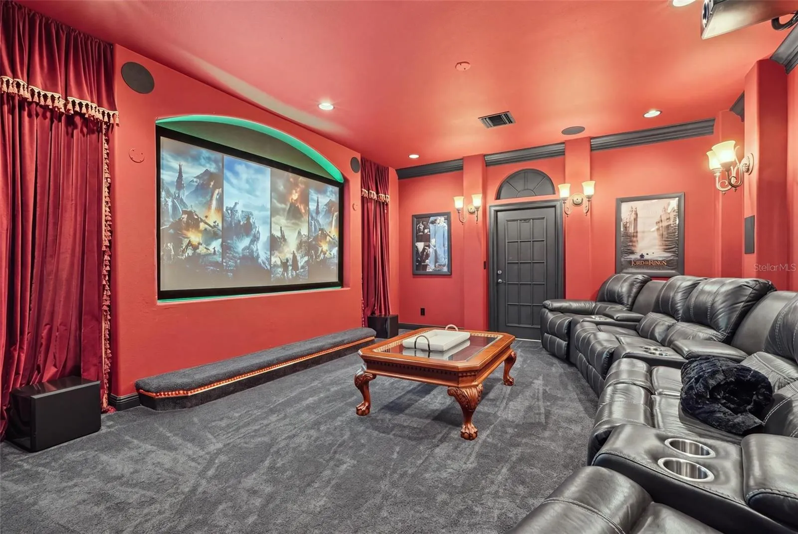 Everything in the theatre room conveys.