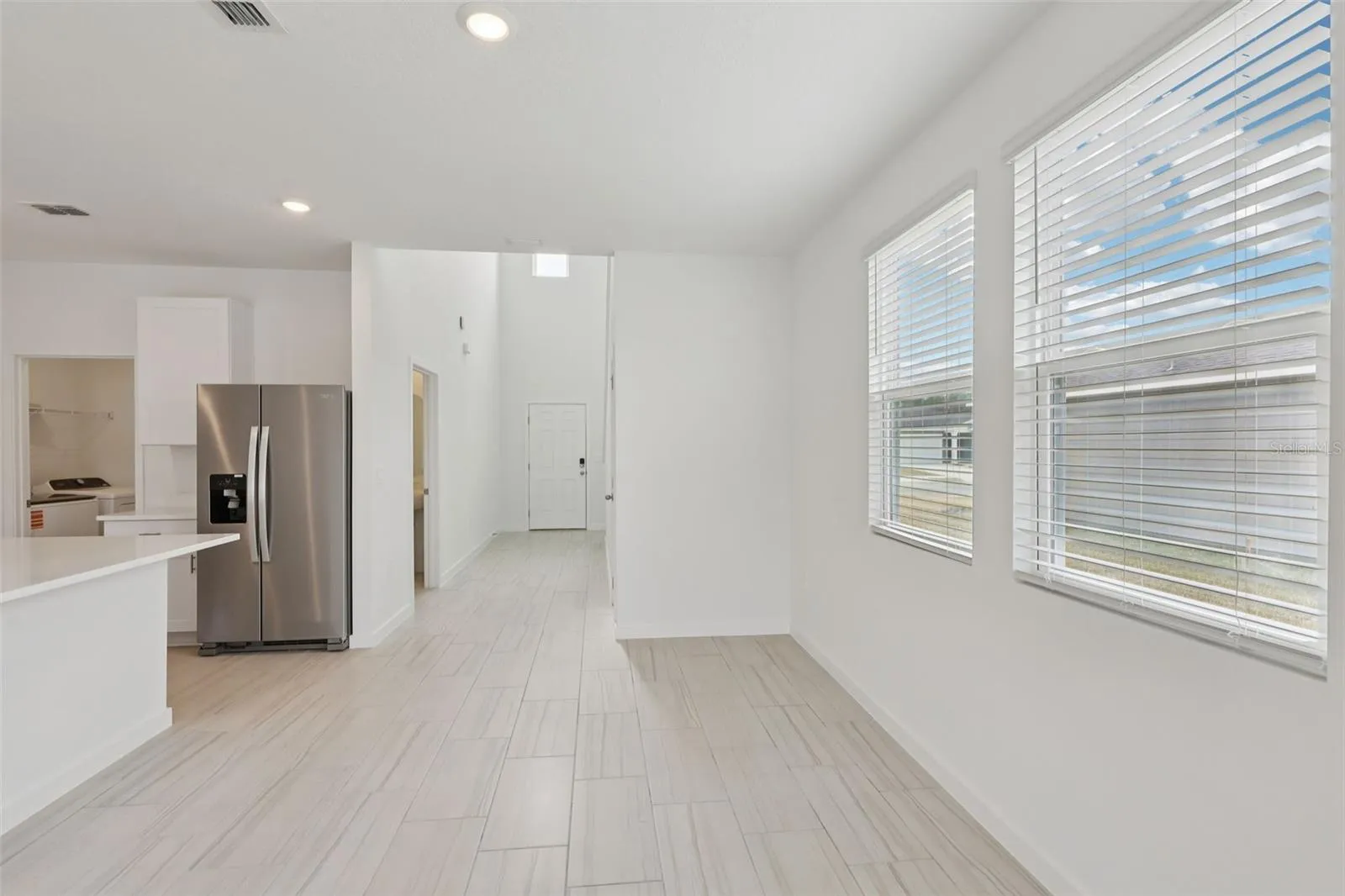 The interior photos are of another home with the same floor plan but different interior color package finishes. Some details may vary