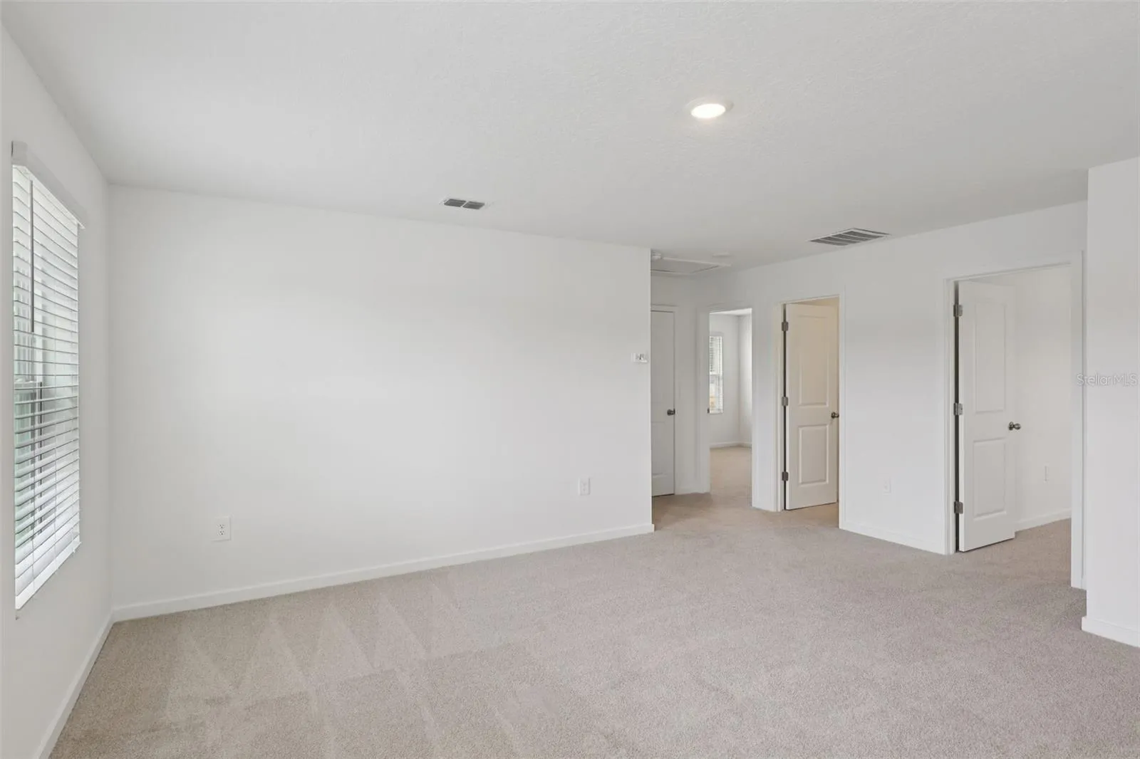 The interior photos are of another home with the same floor plan but different interior color package finishes. Some details may vary