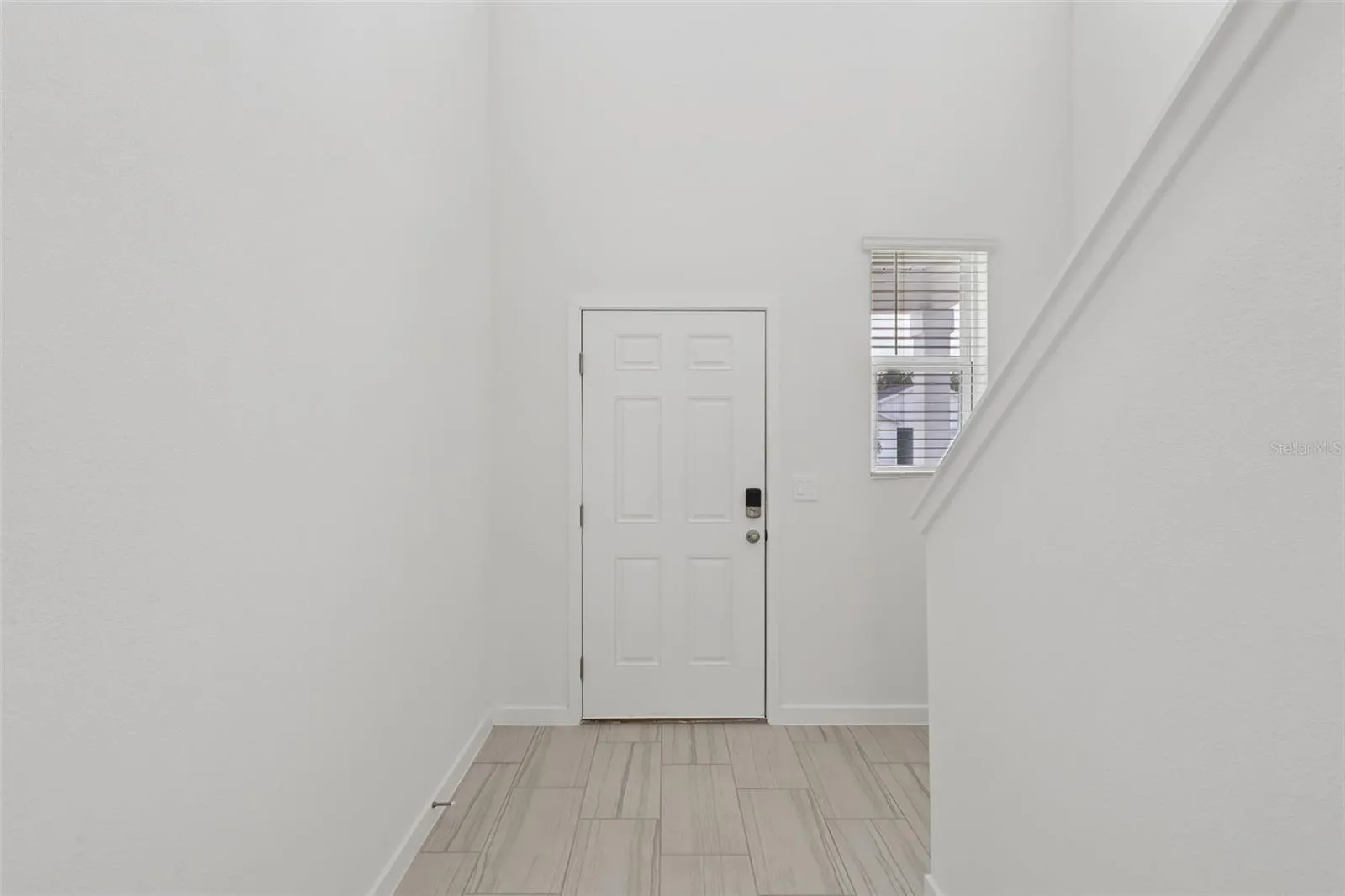 The interior photos are of another home with the same floor plan but different interior color package finishes. Some details may vary