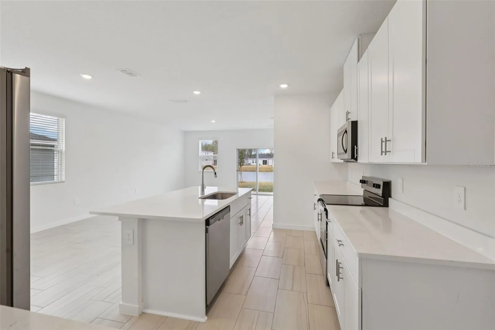The interior photos are of another home with the same floor plan but different interior color package finishes. Some details may vary