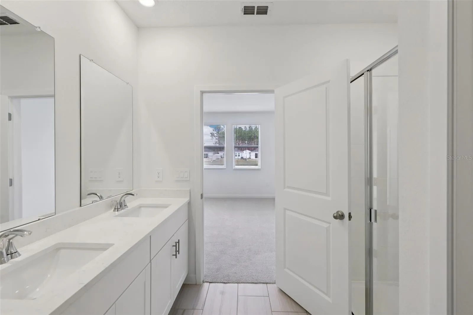 The interior photos are of another home with the same floor plan but different interior color package finishes. Some details may vary