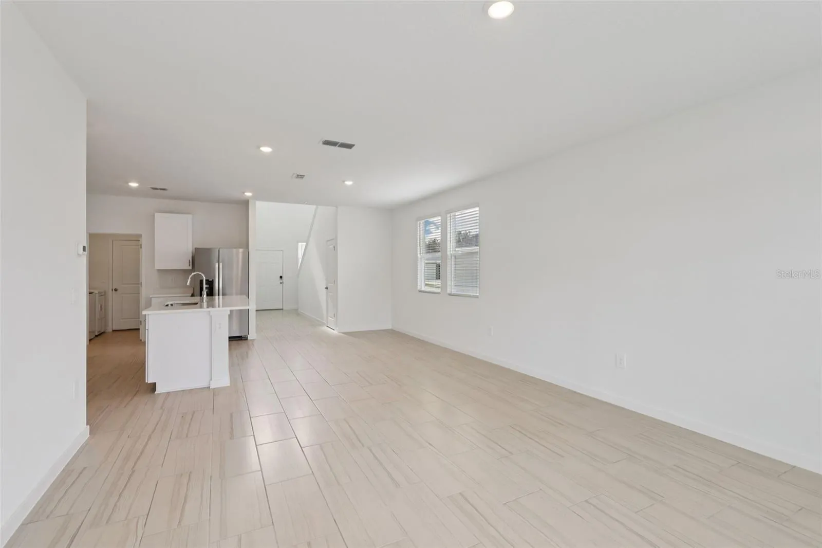 The interior photos are of another home with the same floor plan but different interior color package finishes. Some details may vary