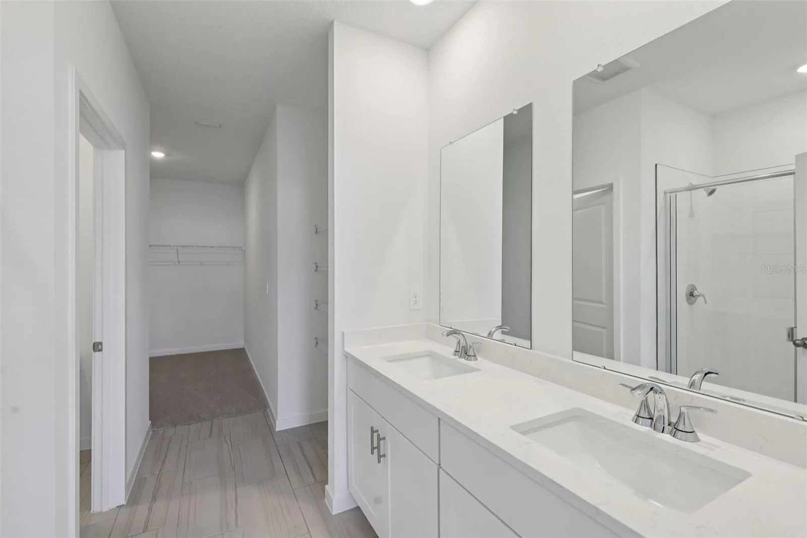 The interior photos are of another home with the same floor plan but different interior color package finishes. Some details may vary