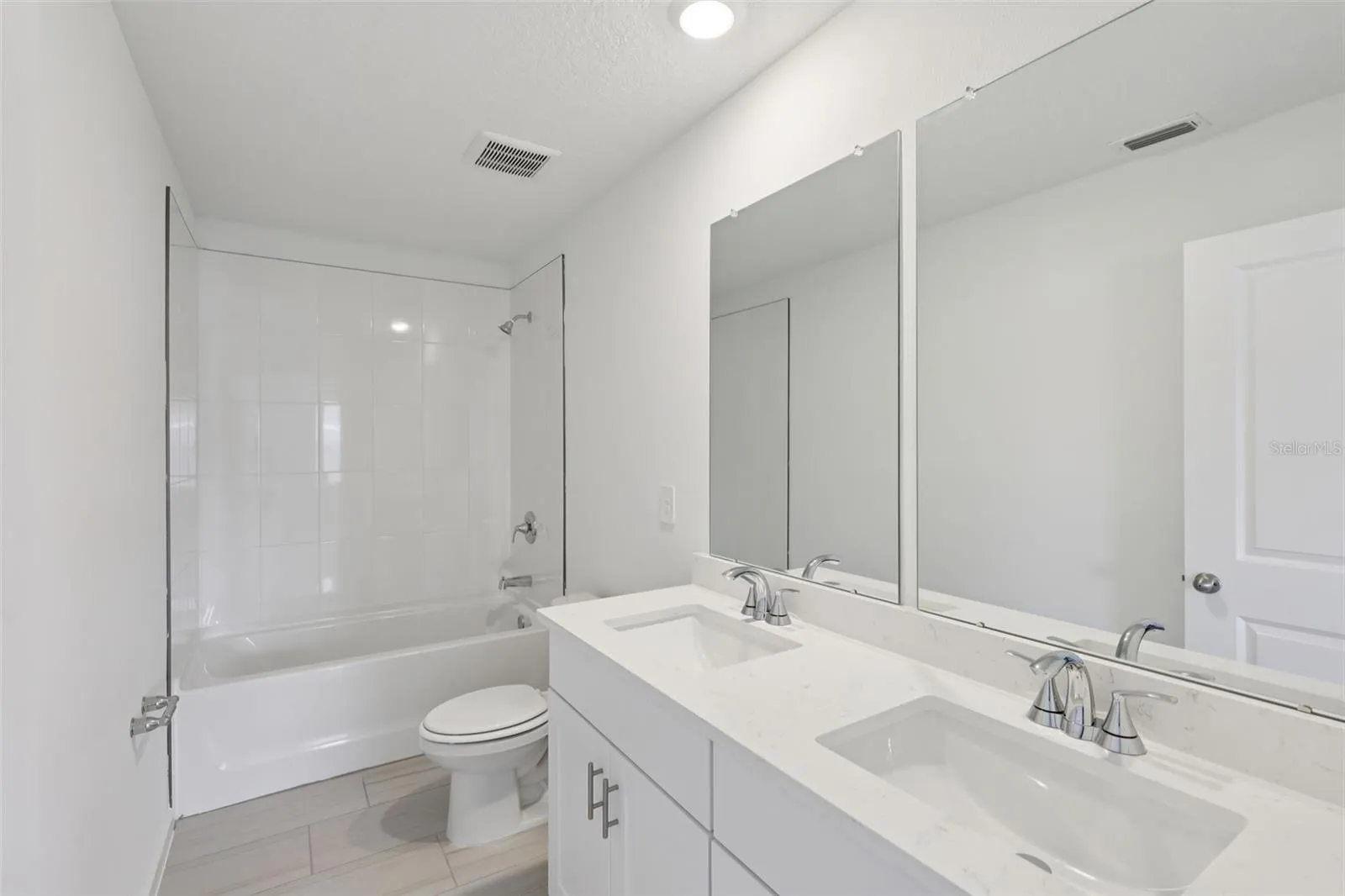 The interior photos are of another home with the same floor plan but different interior color package finishes. Some details may vary