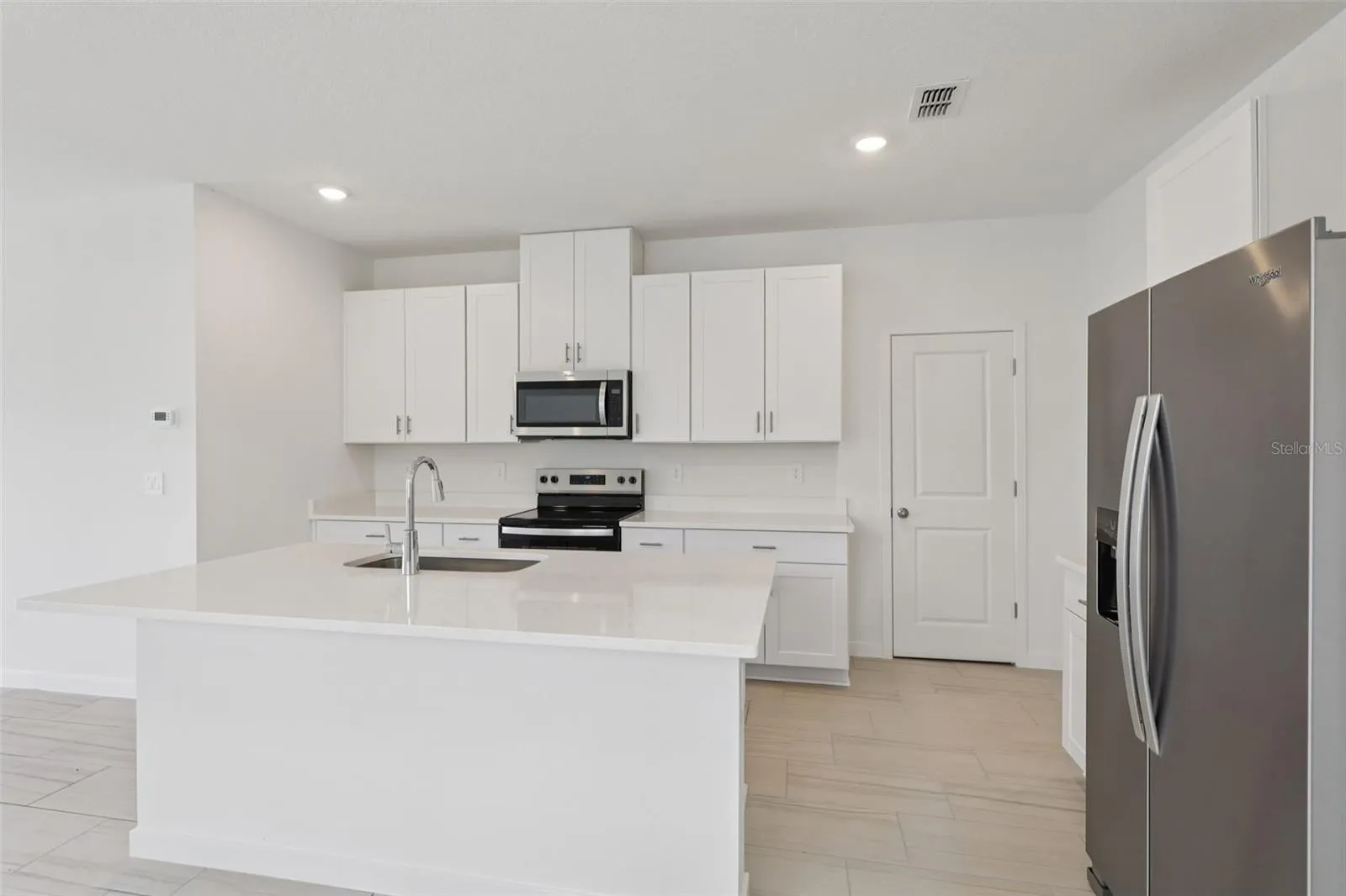 The interior photos are of another home with the same floor plan but different interior color package finishes. Some details may vary