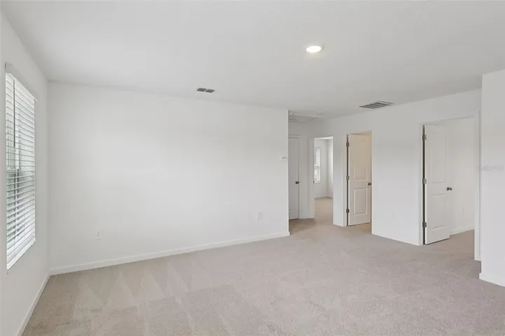The interior photos are of another home with the same floor plan but different interior color package finishes. Some details may vary