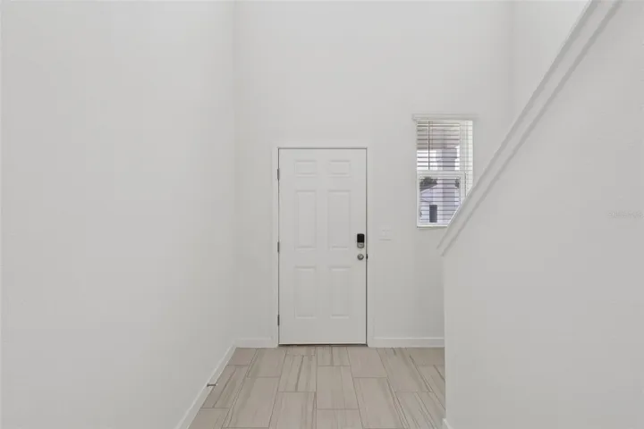 The interior photos are of another home with the same floor plan but different interior color package finishes. Some details may vary
