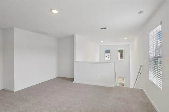 The interior photos are of another home with the same floor plan but different interior color package finishes. Some details may vary