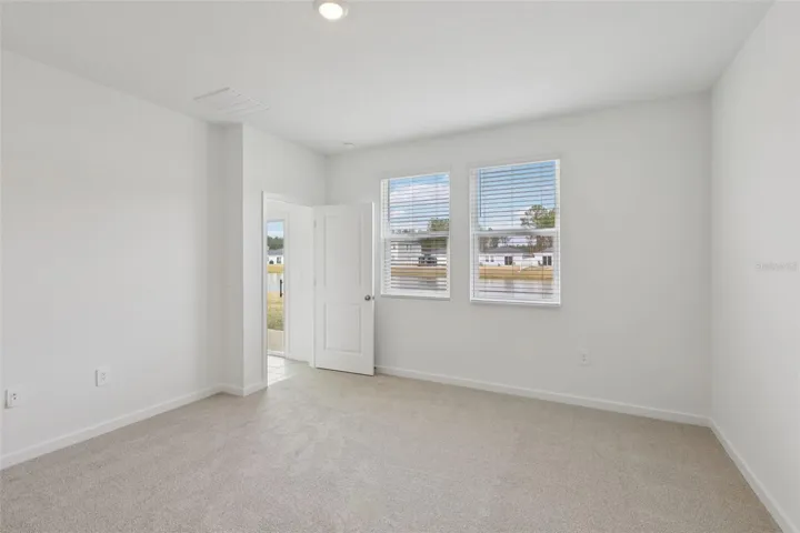 The interior photos are of another home with the same floor plan but different interior color package finishes. Some details may vary