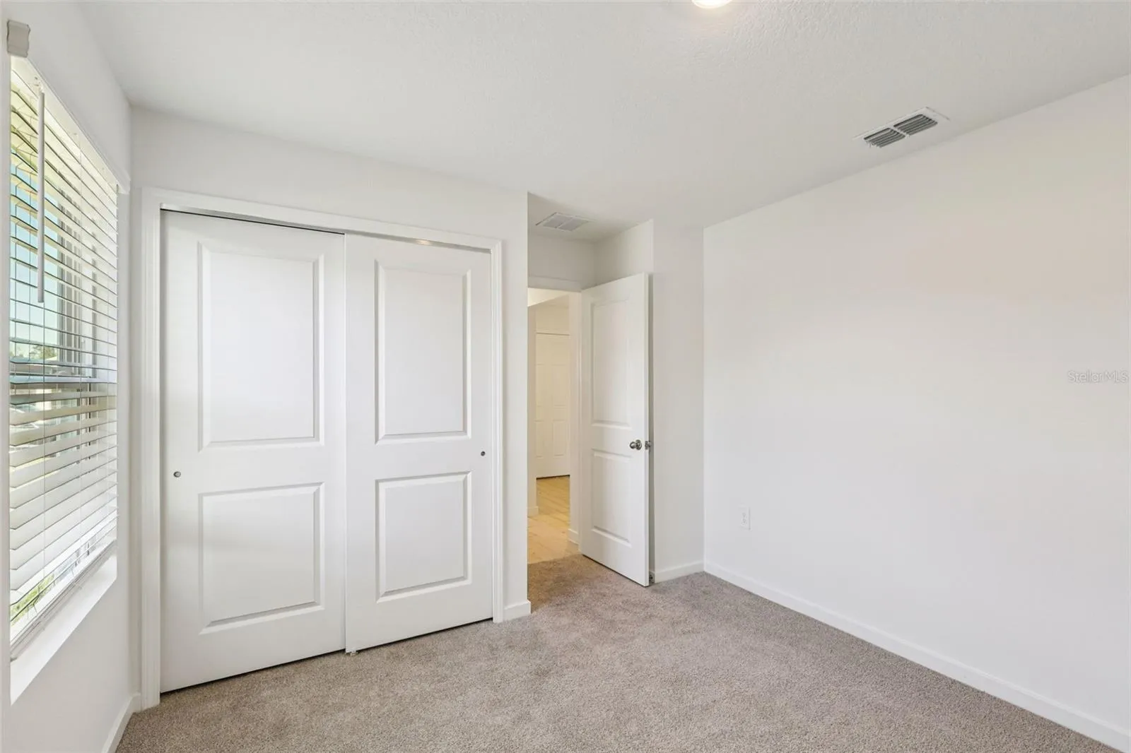 The interior photos are of another home with the same floor plan but different interior color package finishes. Some details may vary