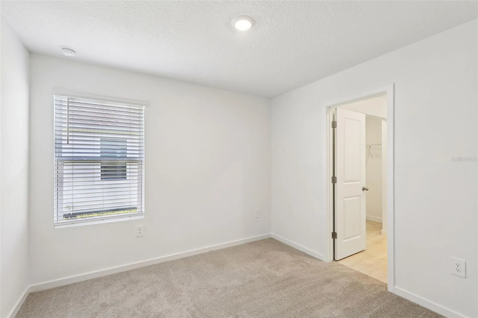 The interior photos are of another home with the same floor plan but different interior color package finishes. Some details may vary
