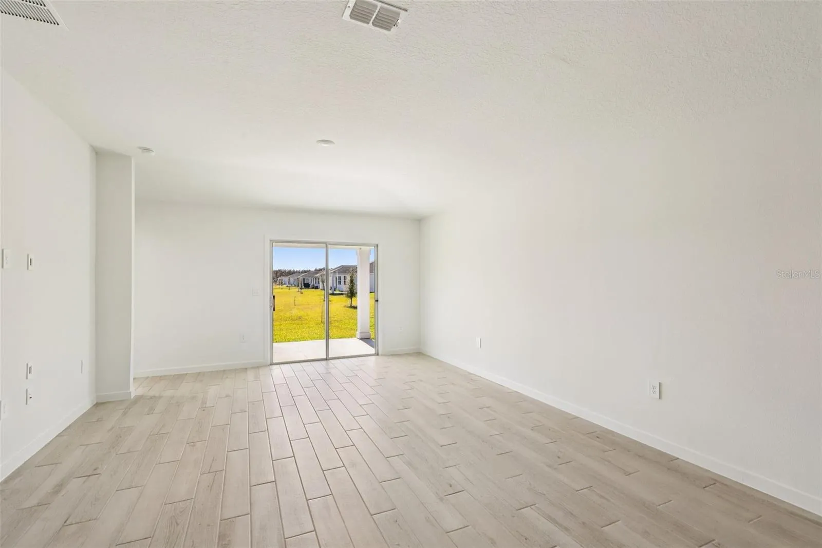 The interior photos are of another home with the same floor plan but different interior color package finishes. Some details may vary