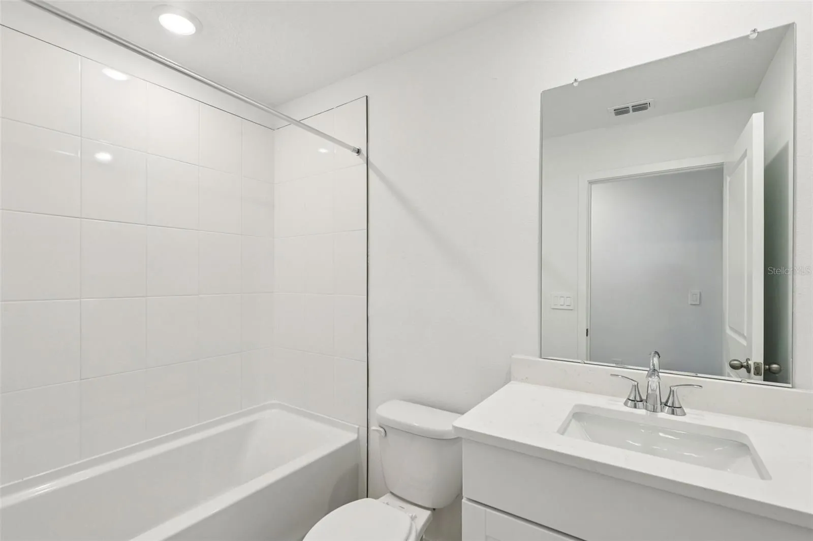 The interior photos are of another home with the same floor plan but different interior color package finishes. Some details may vary
