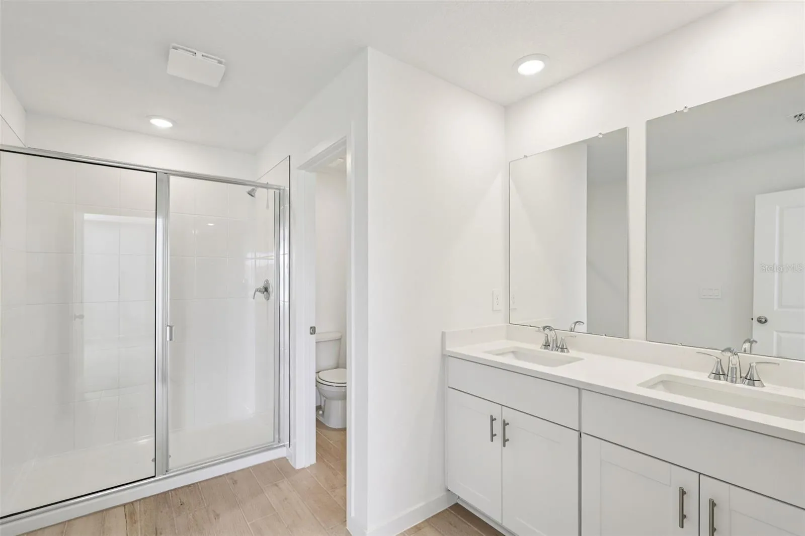 The interior photos are of another home with the same floor plan but different interior color package finishes. Some details may vary