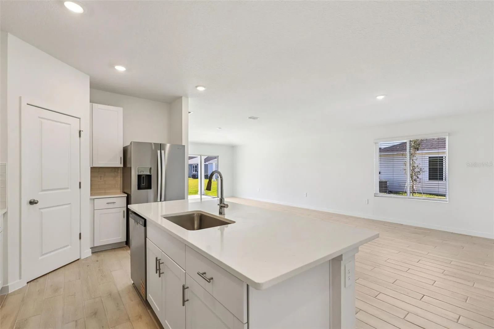 The interior photos are of another home with the same floor plan but different interior color package finishes. Some details may vary
