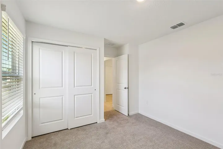The interior photos are of another home with the same floor plan but different interior color package finishes. Some details may vary