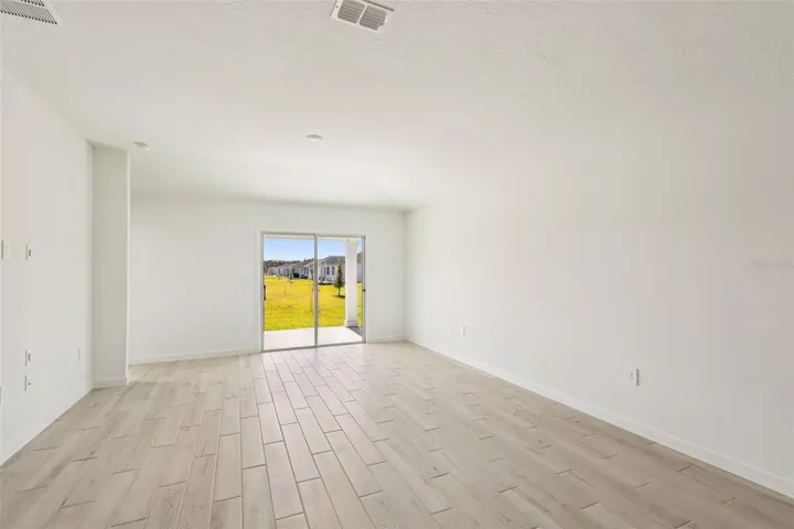 The interior photos are of another home with the same floor plan but different interior color package finishes. Some details may vary