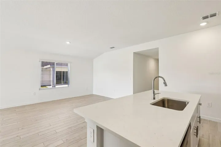 The interior photos are of another home with the same floor plan but different interior color package finishes. Some details may vary