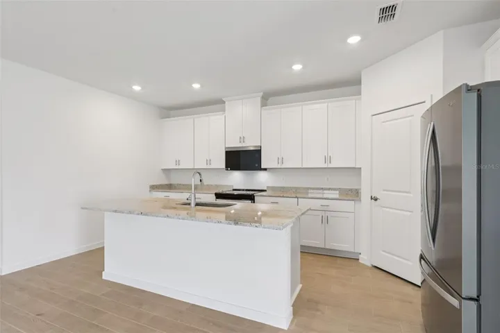 The interior photos are of another home with the same floor plan and interior finishes. Some details may vary