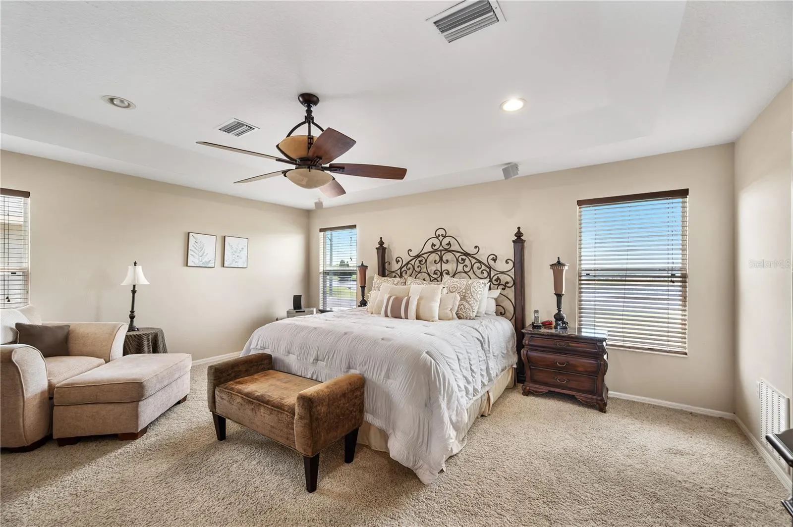 The Primary Suite is well appointed and has a spectacular view of Island Lake &amp; the 15 Hole .