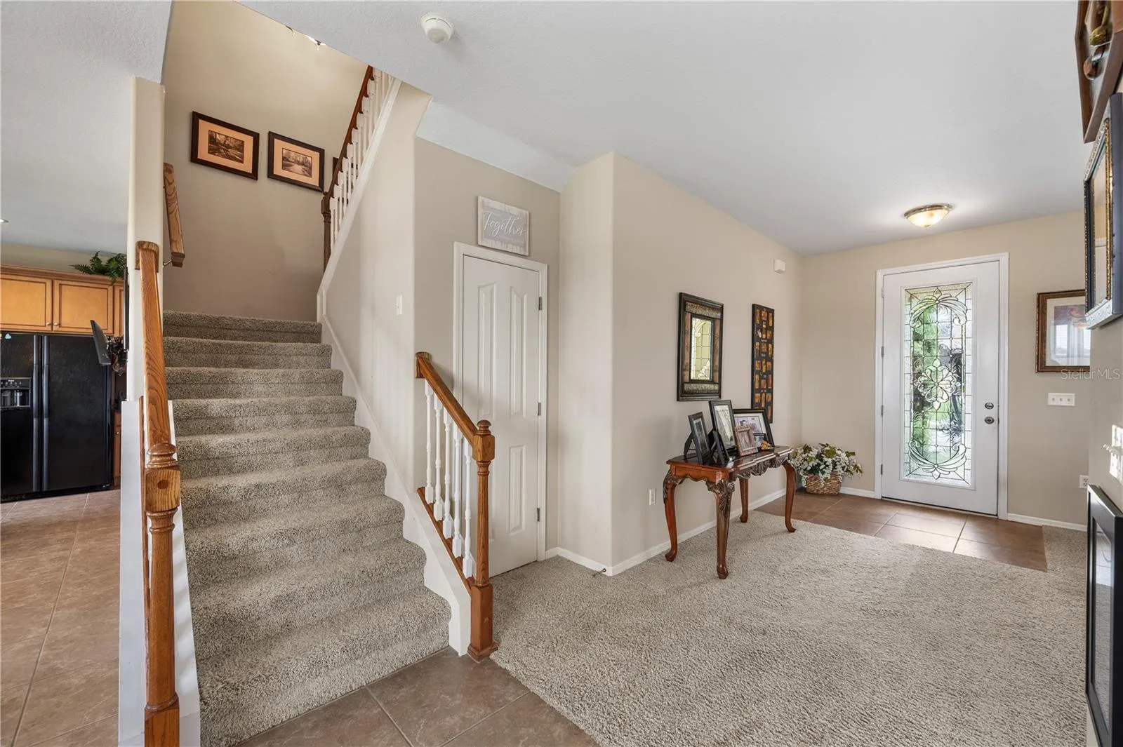 Up to the second floor....the door to the right of the stair case has ample storage.