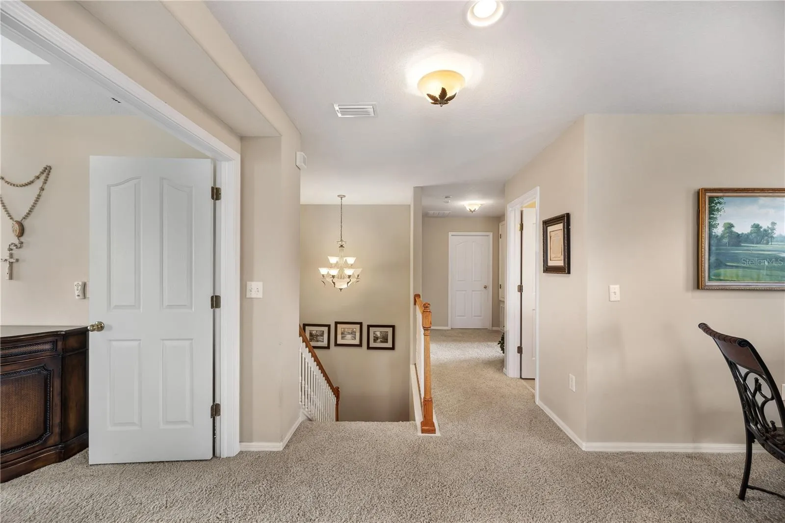 Upstairs , there are 3 bedrooms including the Primary bedroom along with an awesome media, game, movie room..perfect for family fun nights!
