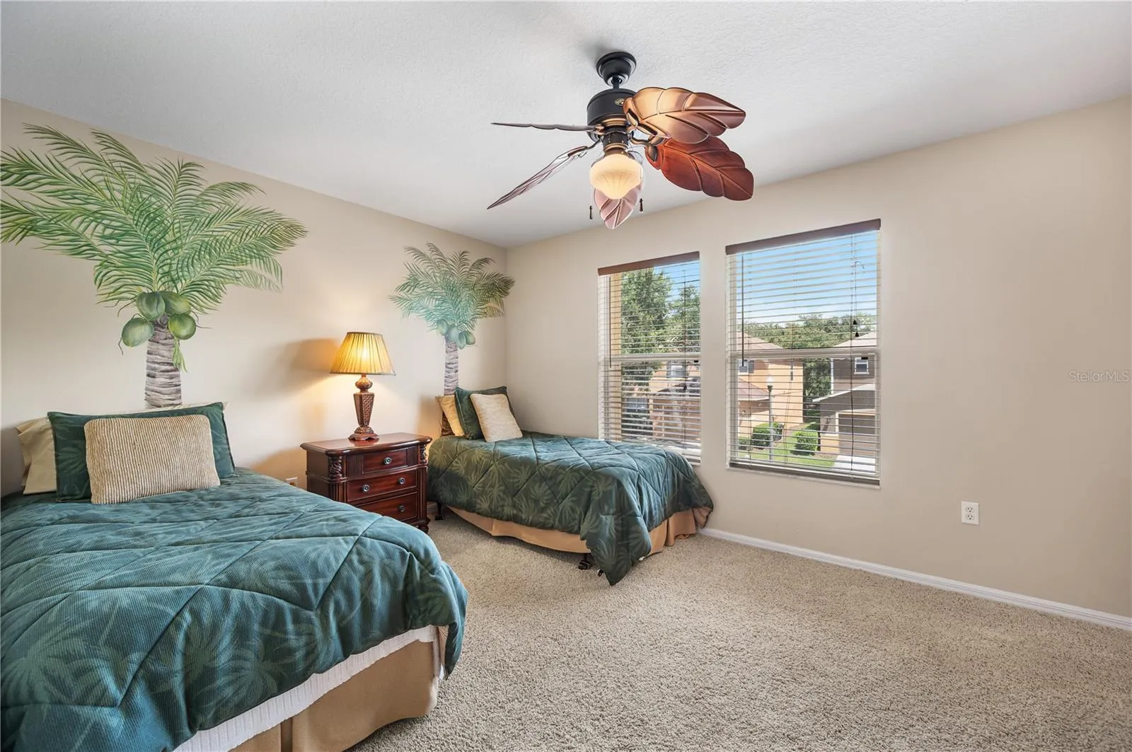 Bedroom #2 is spacious and has a large walk in closet
