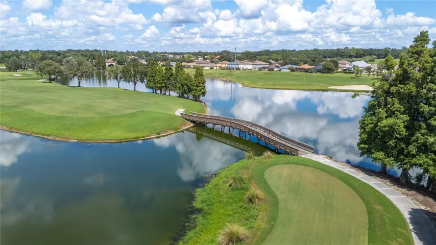 The 15th hole and bridge to the 14th hole on the golf course at The Club at Eaglebrooke