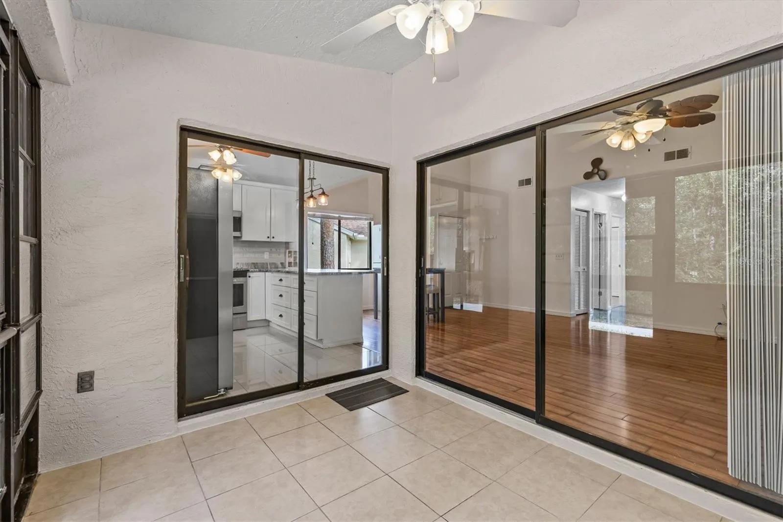 Two Sliding Glass Doors going into the home