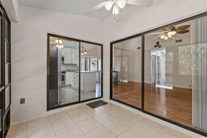 Two Sliding Glass Doors going into the home