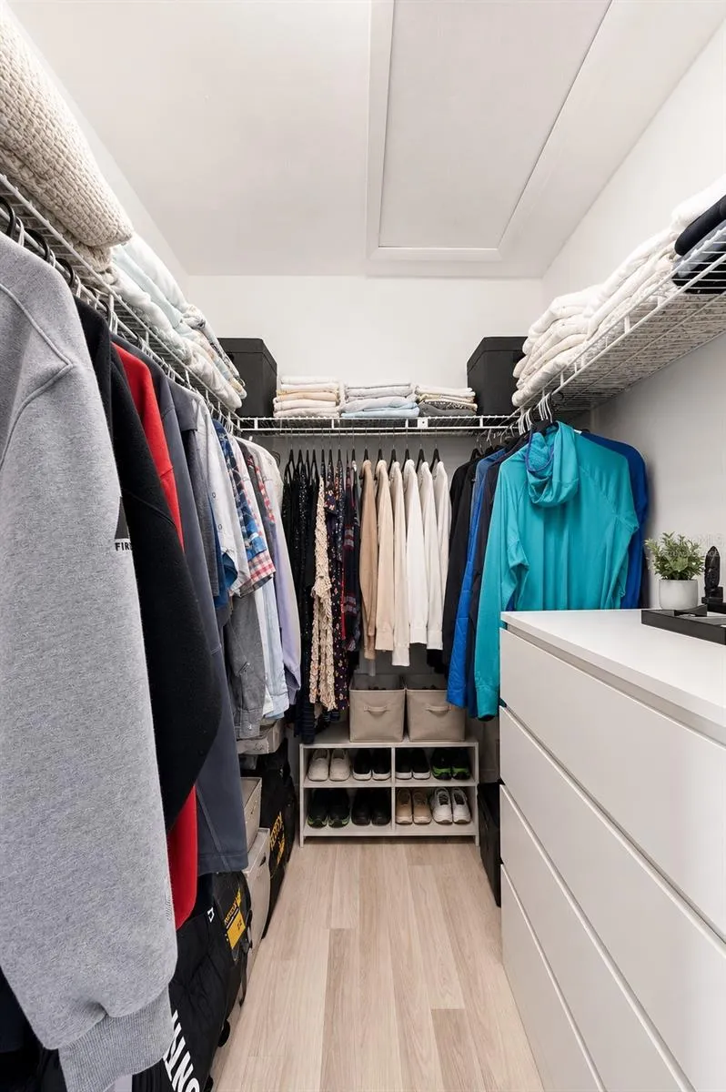 Primary Custom Built in Closet - Virtually Staged