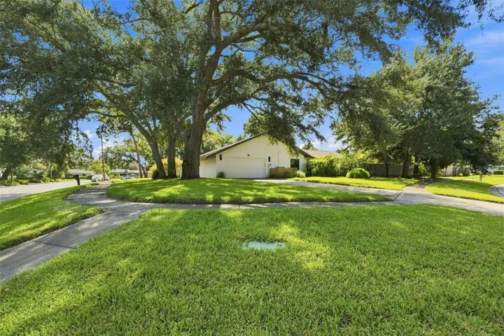 Two car garage with ample driveway parking
