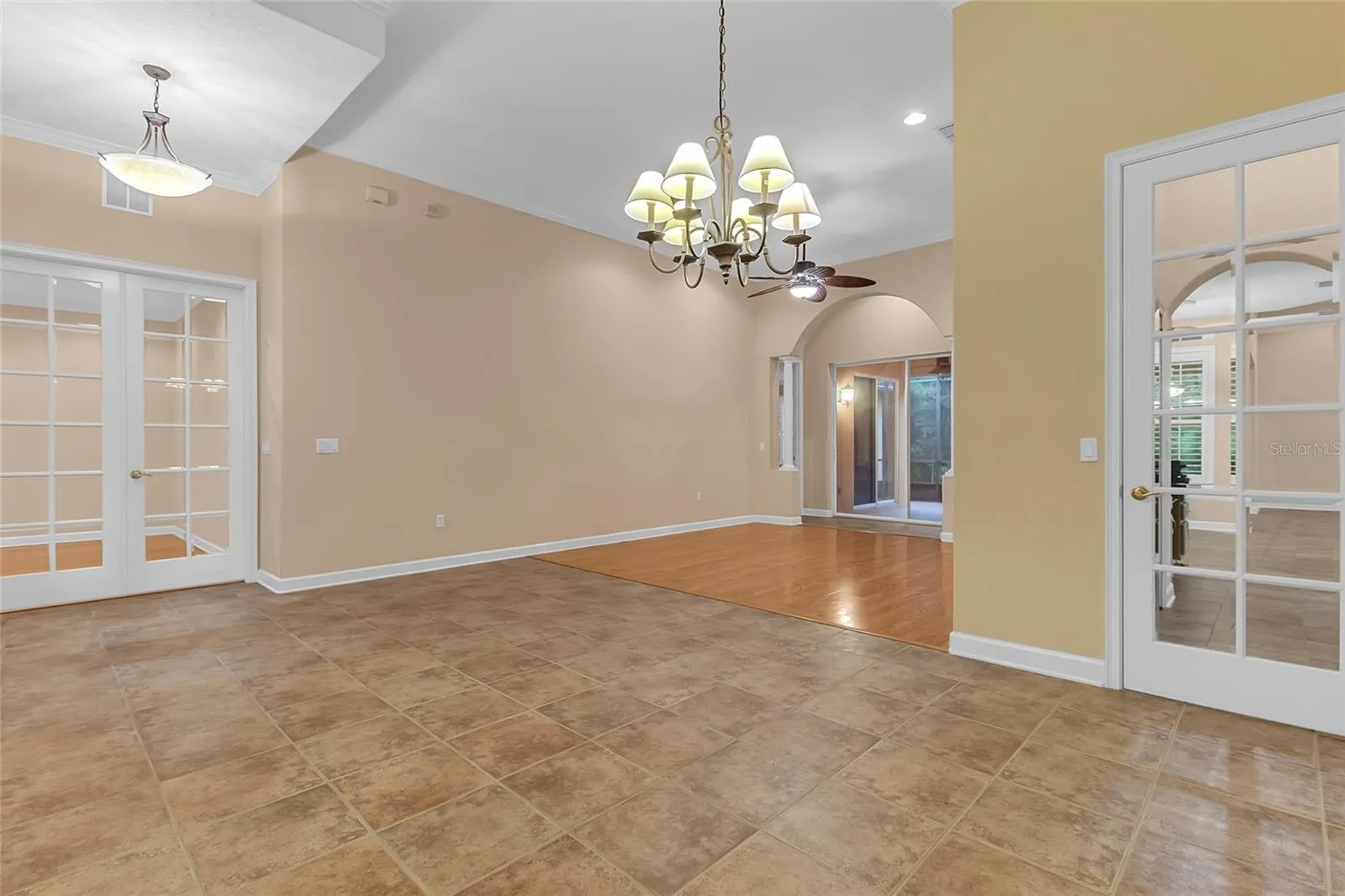 Dining Room/Formal Living Room. The 8' French Doors lead to the Office while the 8' Single Door lead to the Kitchen/Laundry Room.
